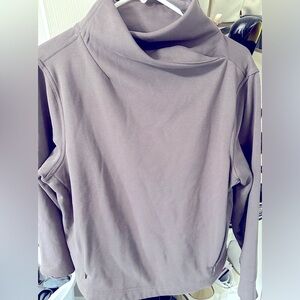 Gray Apana pullover sweater.